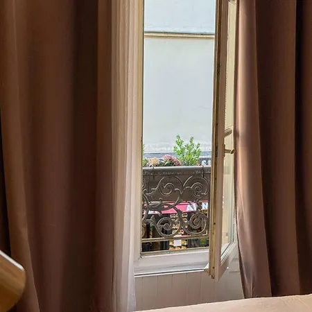 Between The Arc De Triomphe And The Sacr-cur Апартаменты *